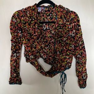 Urban Outfitters wrap blouse. Ruffled. Large. Nice condition. Faux tie.